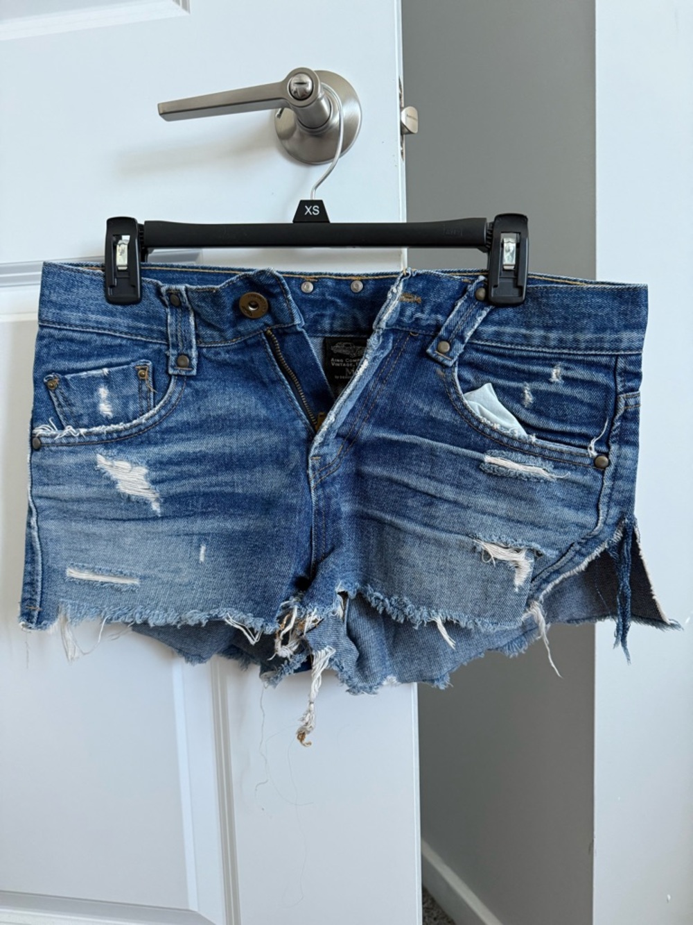 Distressed Blue Denim Cutoff Shorts - Women